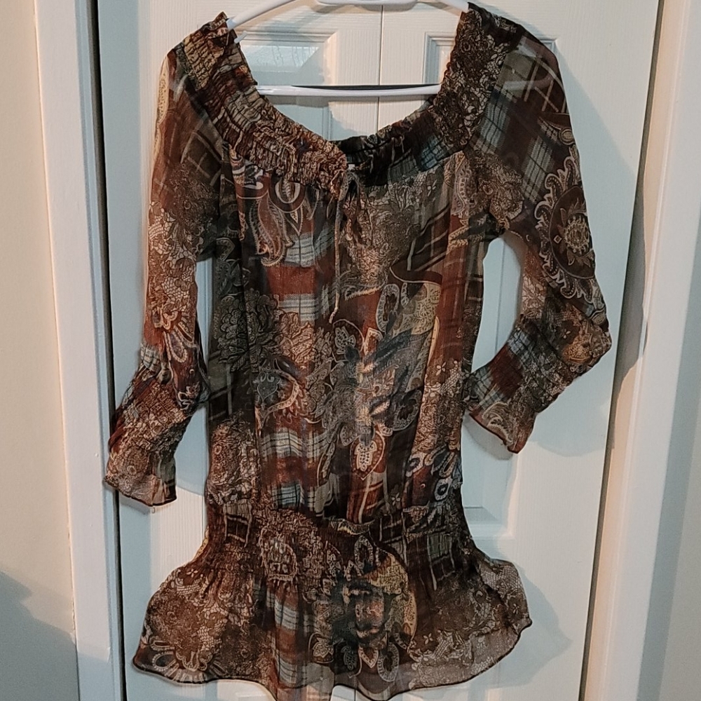 Women`s blouse from veil fabric